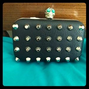 Black skull clutch handbag
